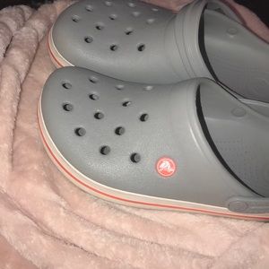 1 pair of Crocs